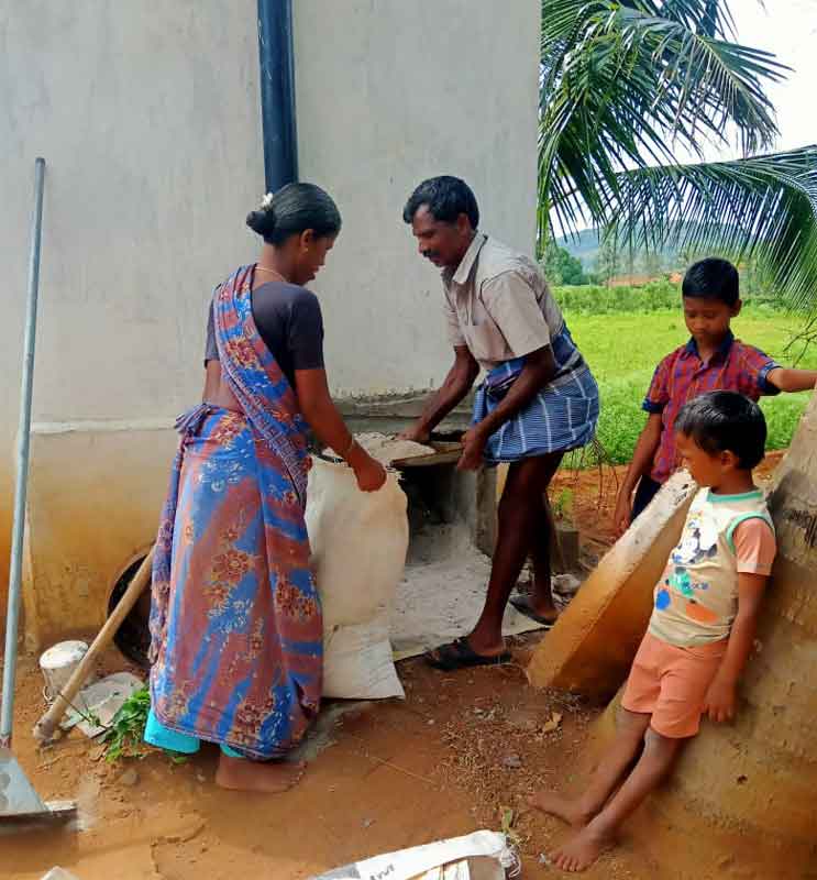 Residents emptying dry compost